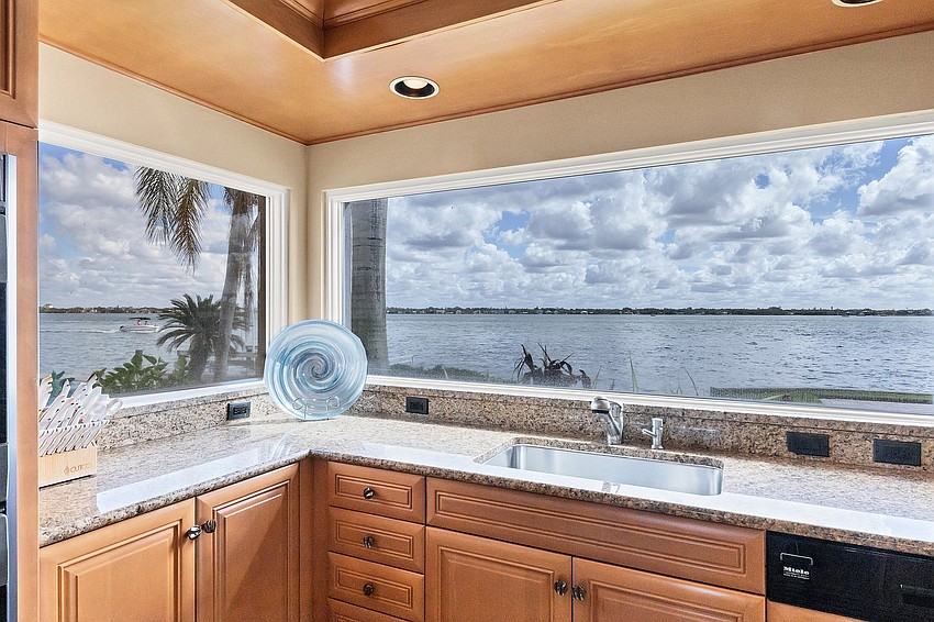 The kitchen windows overlook Sarasota Bay.