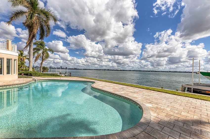 The saltwater pool is just steps from Sarasota Bay.
