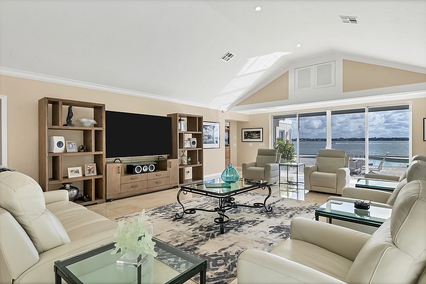 The living space features a vaulted ceiling.