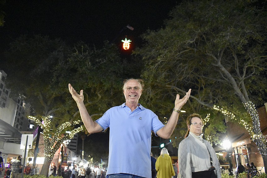 Ron Soto admires the pineapple as it brings thousands of people for the new year countdown.
