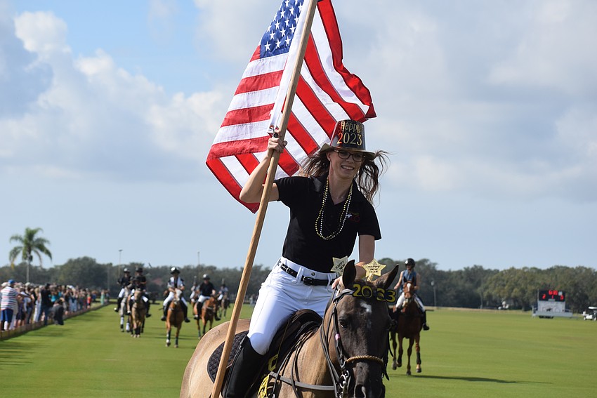 Paige Lautzenheiser rings in the new year by presenting the colors at the Sarasota Polo Club on New Year's Day.