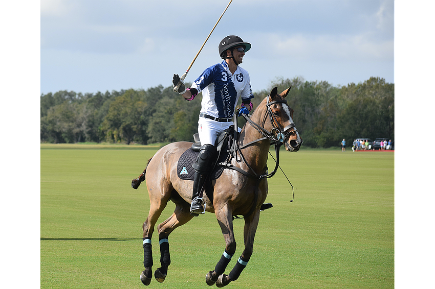 Alan Martinez of the North South Wealth Management/Ranch Hand team obviously is happy to be back in action as the Sarasota Polo Club opened its new season Jan. 1.