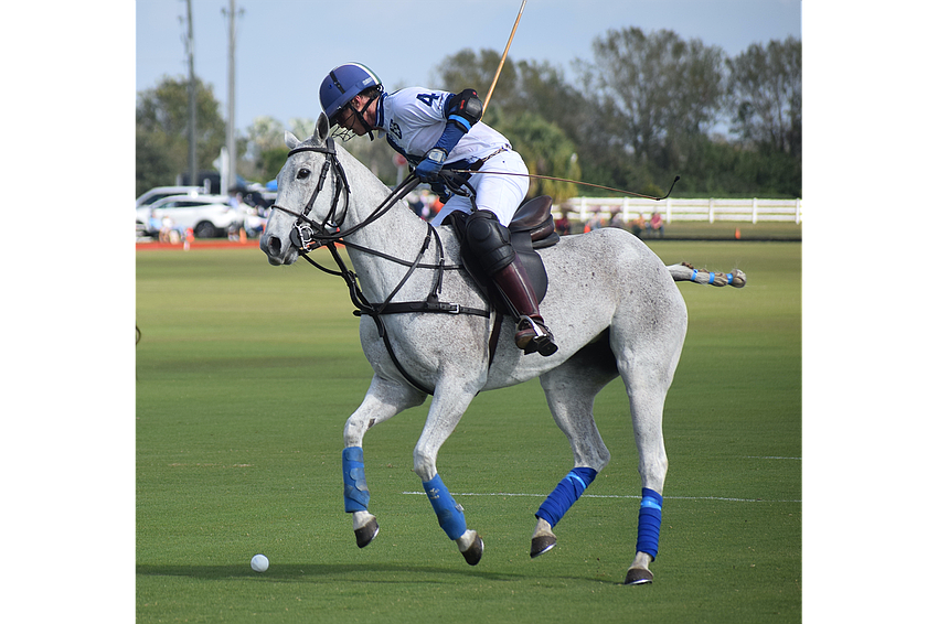 Stuart Campbell of North South wealth Management/Ranch Hand fires a shot in the Sarasota Polo Club's 2023 season opener.