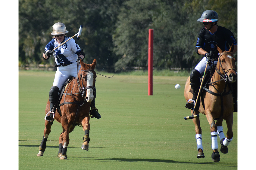 Claire Dornak of North South Wealth Management/Ranch Hand, zips a shot past Barefield/Hawkwood's Vasco Iriate.