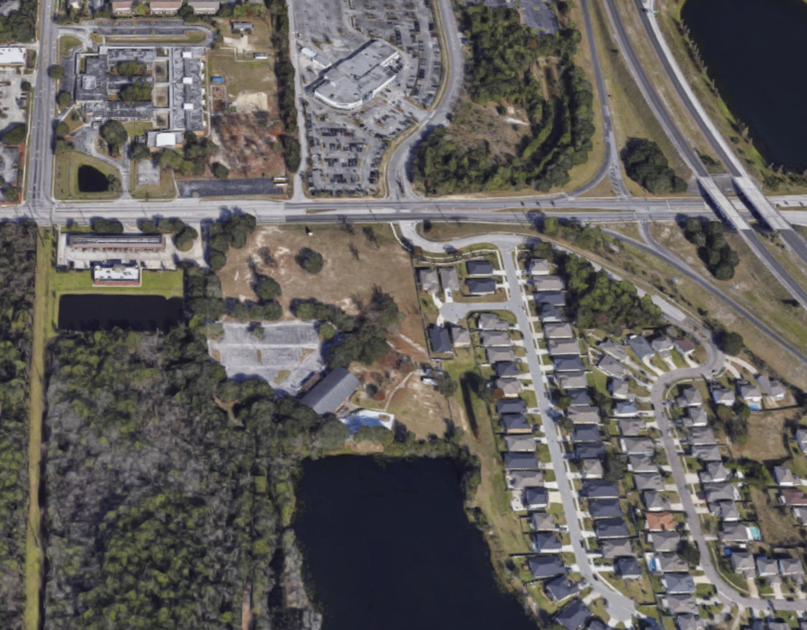 The site is west of Interstate 95 across the street from Merrill Road Elementary School.