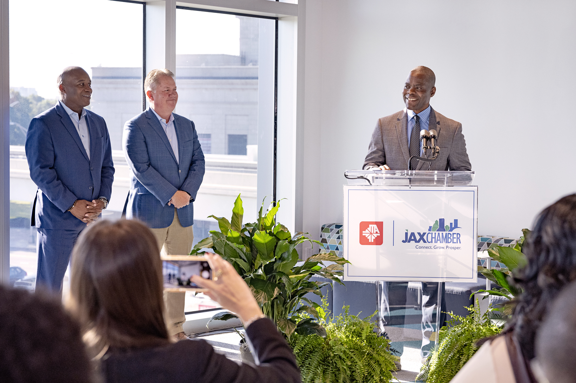 From left, Jacksonville Transportation Authority CEO Nathaniel Ford Sr.; JAX Chamber Chair and JTA board member Ray Driver; and JAX Chamber Chief Innovation Officer Carlton Robinson at the Oct. 21 grand opening.
