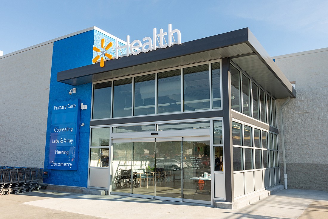 File image: Walmart clinics are built alongside Walmart stores. The company has opened the clinics in Arkansas, Illinois, Georgia and Texas and expects to open 16 in Florida.