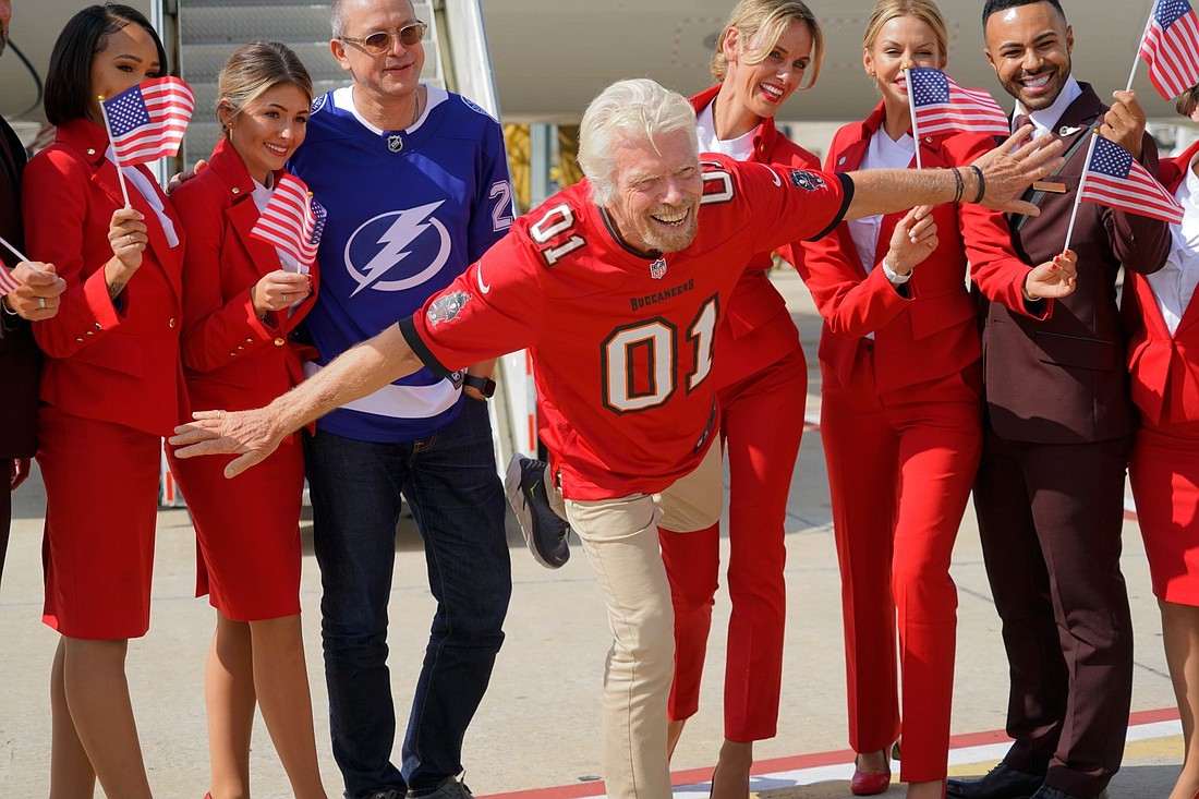Billionaire Sir Richard Branson, the founder of Virgin Atlantic, celebrates the airline&#39;s new direct route from Tampa to London on Wednesday at Tampa International Airport. (Courtesy photo)