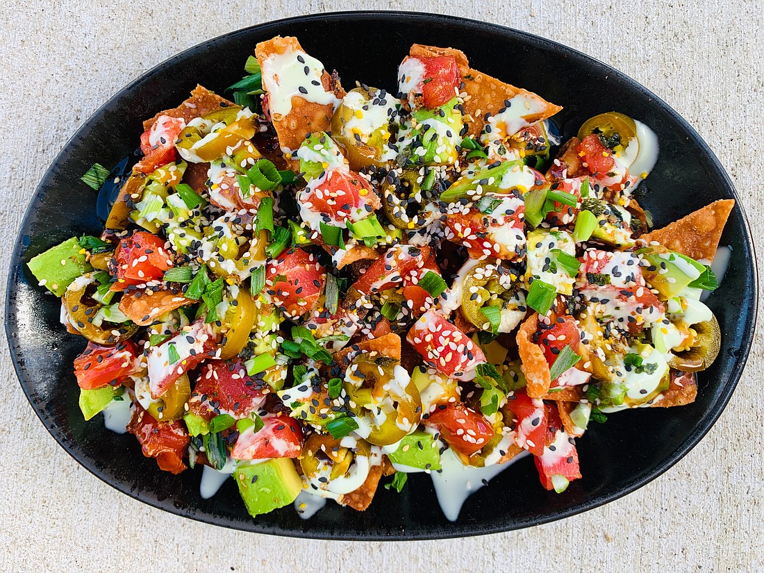 The tuna poke nachos featured on the menu at Chuck Lager America&#39;s Tavern. (Courtesy photo)