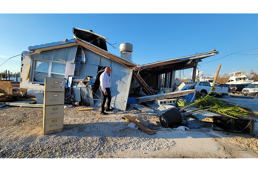 Cecil Pendergrass, Lee County Commission Chairman and chair of the Lee County Tourist Development Council inspects damage after Hurricane Ian. (Courtesy photo)
