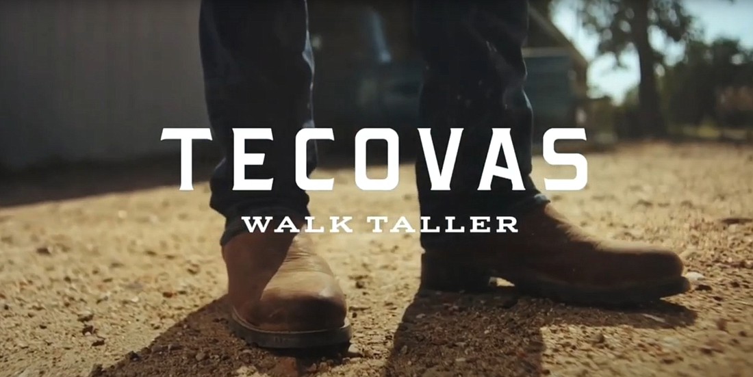 The ad Alchemy created for Tecovas shows people wearing boots in various settings with the tagline, â€œwalk taller.â€