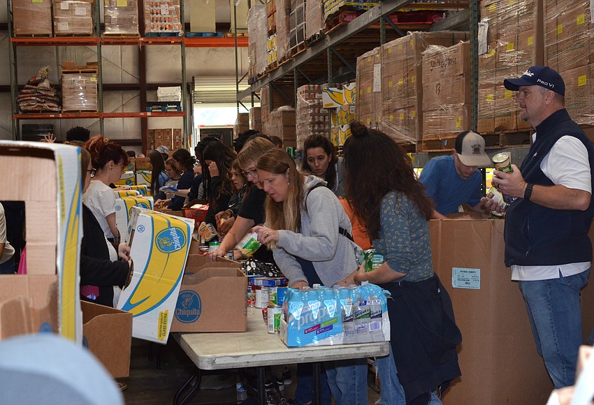 Southeastern Food Bank packs Thanksgiving boxes West Orange Times