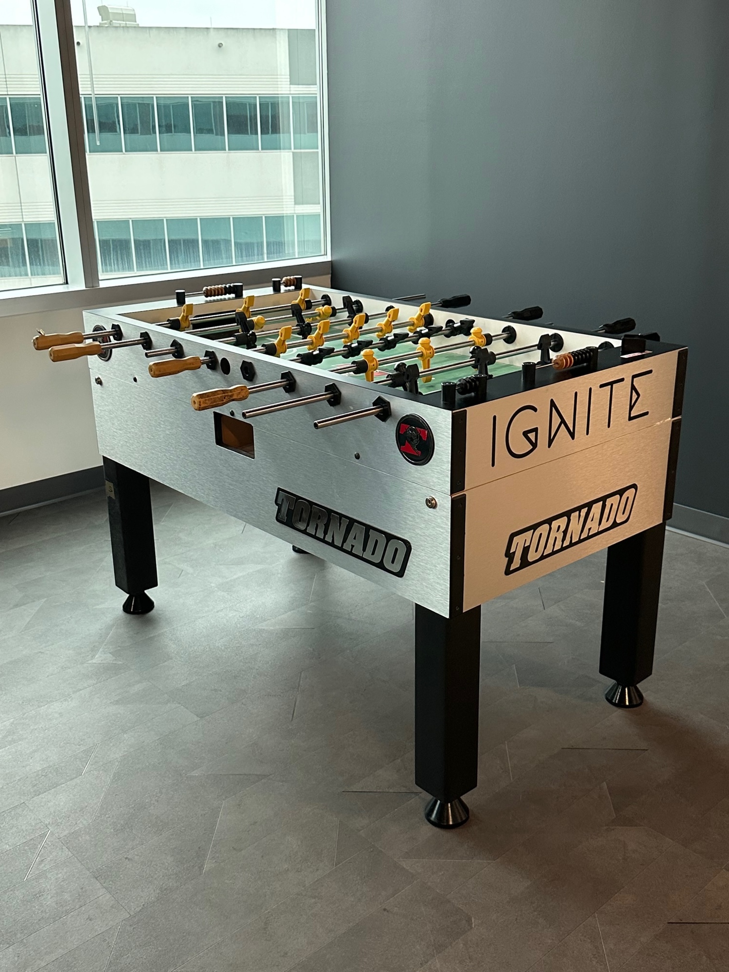 A foosball table is available for play.