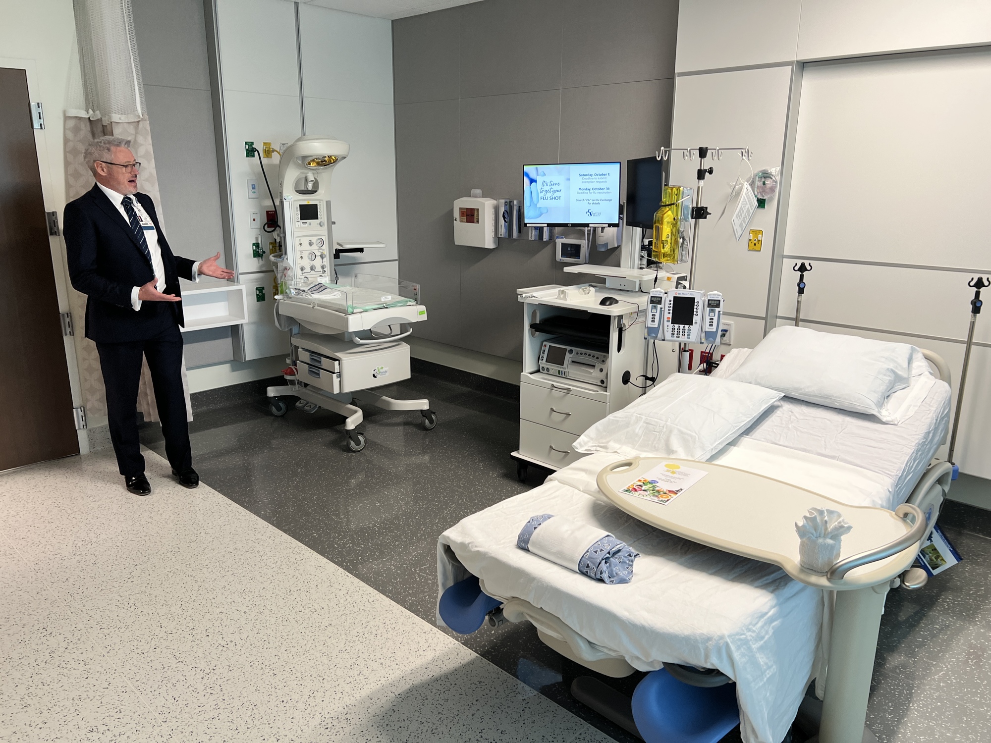 Hospital President Darin Roark shows one of the 20 maternity suites at Baptist Medical Center Clay. The rooms have the delivery equipment in designated storage areas.