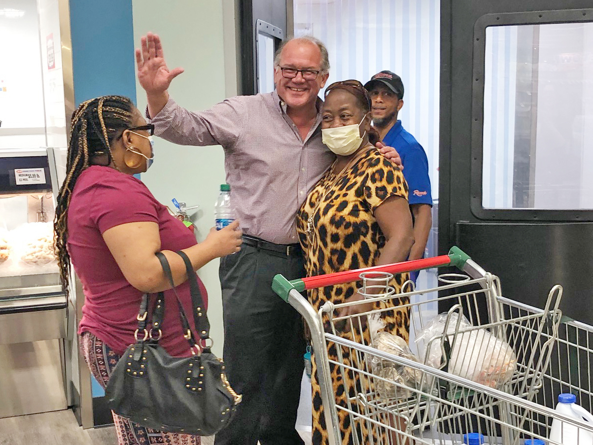 Rob Rowe greets customers at the opening of his Commonwealth Shopping Center at 1012 Edgewood Ave. N. in 2020.
