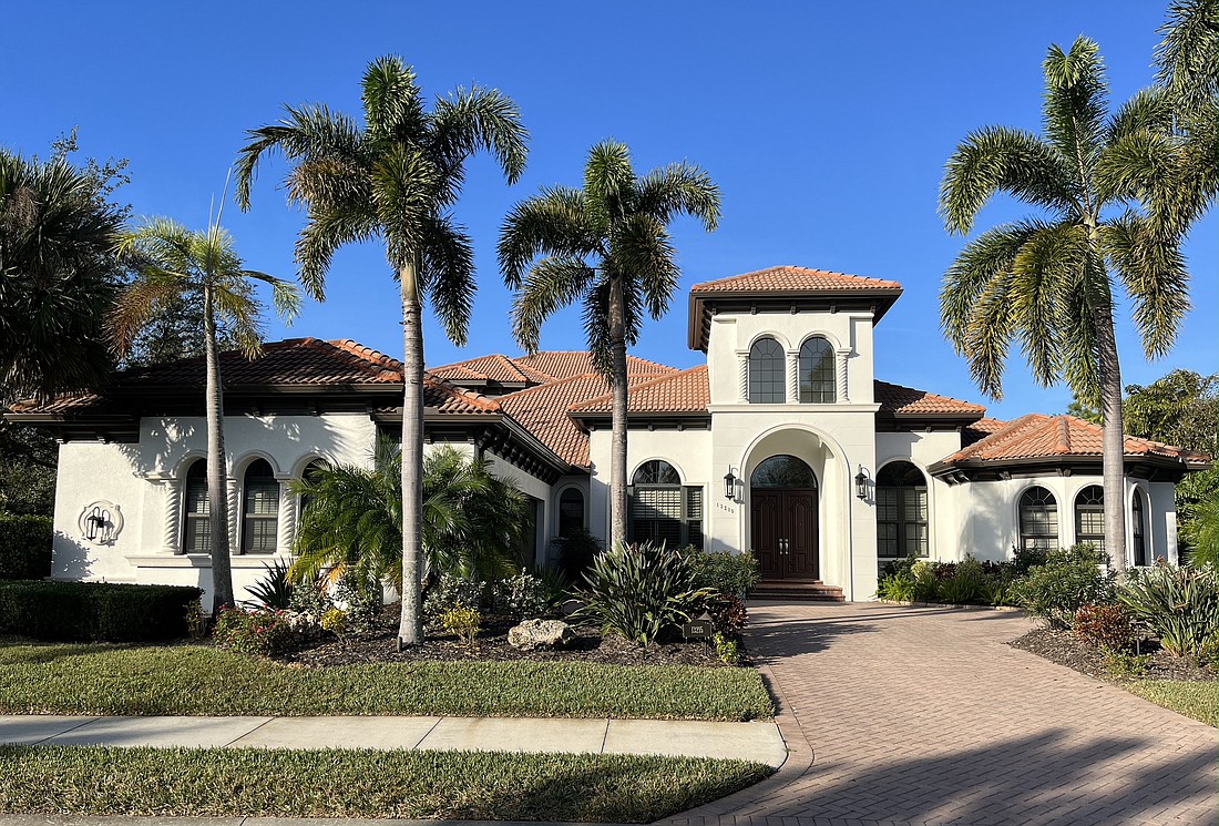 This Country Club home at 13215 Palmers Creek Terrace sold for $1,935,500. It has four bedrooms, four baths, a pool and 4,701 square feet of living area.