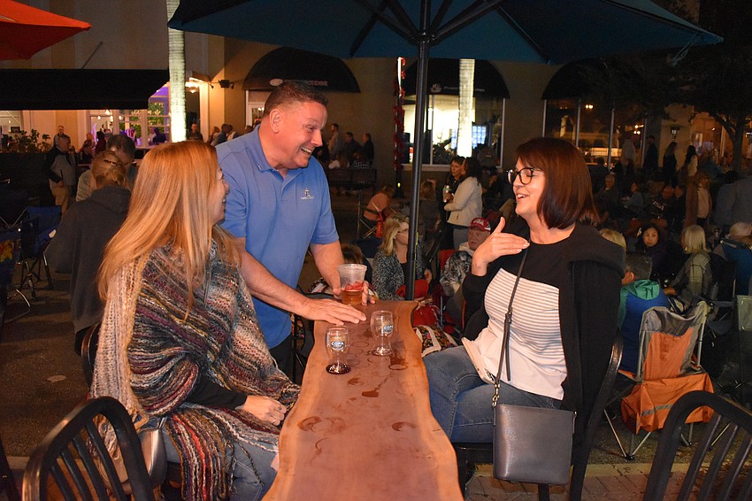 Sarasota's Sherri Connor, John Hamish from Nevada, and Lakewood Ranch's Julie North enjoy one another's company.