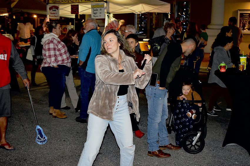 Lakewood Ranch's Kristen Joseph tries her hand at lacrosse.