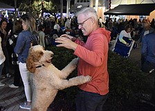 Lakewood Ranch's Mike Minic is in the same playful mood as his dog, Chelsea.