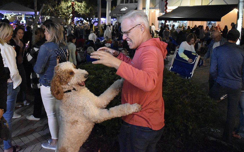 Lakewood Ranch's Mike Minic is in the same playful mood as his dog, Chelsea.