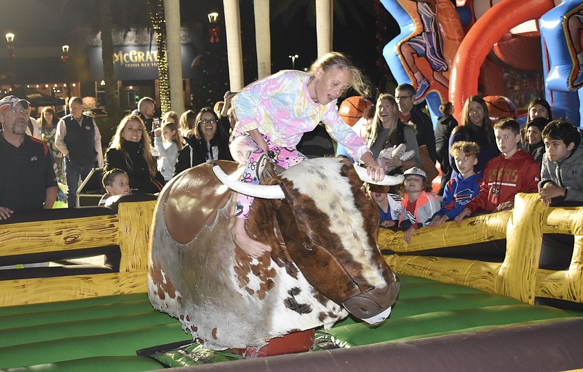 Ellington's Amber Elmaleh does an expert job at staying on a mechanical bull.