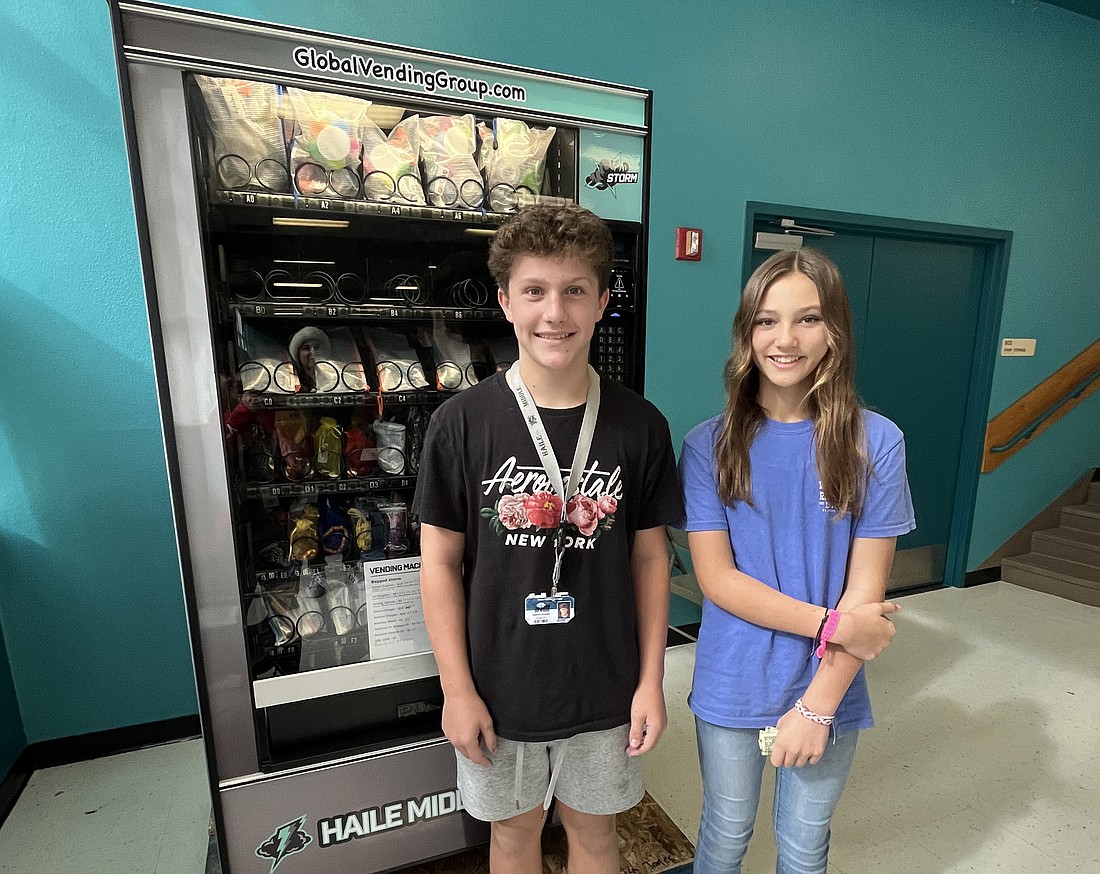 Students like seventh graders Jayden Lavalle and Kiley Nowaczyk have fun creating items and determining what to sell in the vending machine.