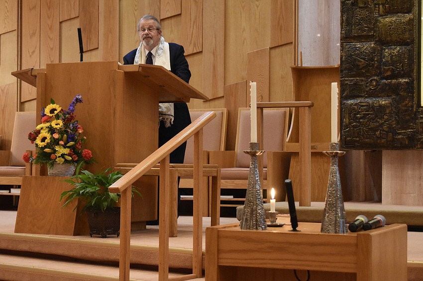Rabbi Stephen Sniderman welcomes his congregation.