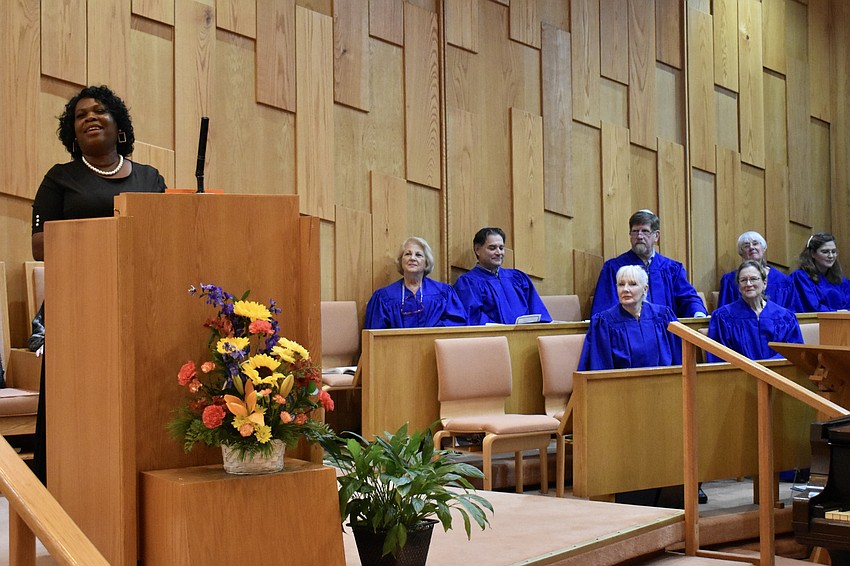 April Glasco takes over for the choir and sings gospel.