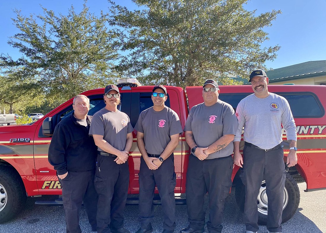 The second Strike Team: Battalion Chief Cody King, firefighter-paramedics Ron Titus and Justin McDonald, Community Paramedic Rob Errett, and firefighter-paramedic Adam VanDeusen. Courtesy photo from Flagler County