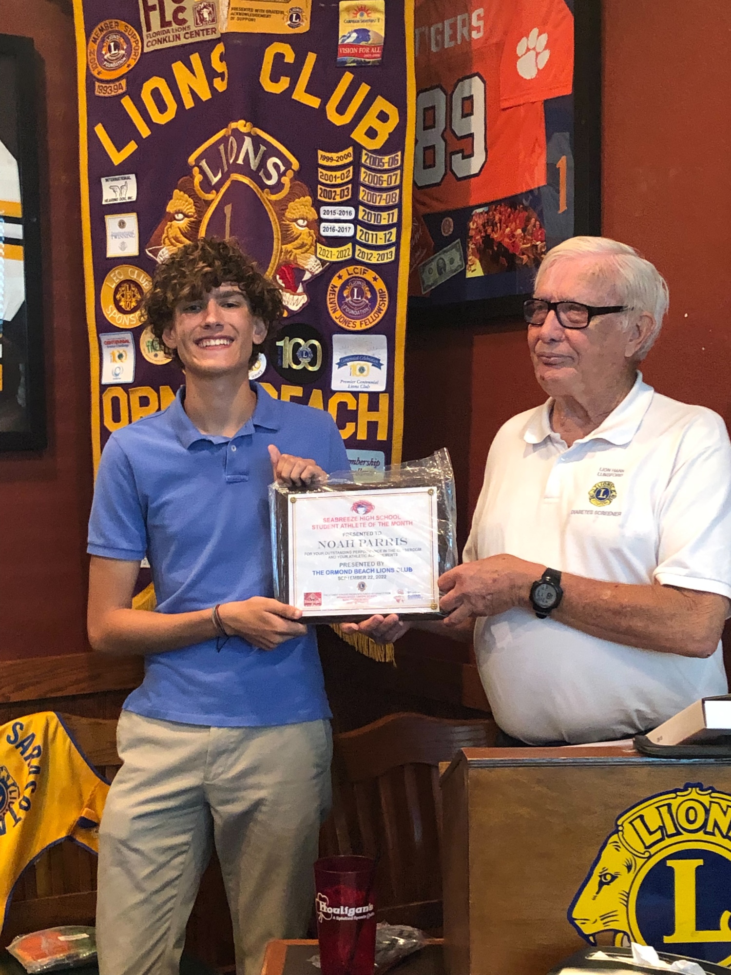 Noah Parrish and Hank Lunsford, president of the Ormond Beach Lions Club. Courtesy photo