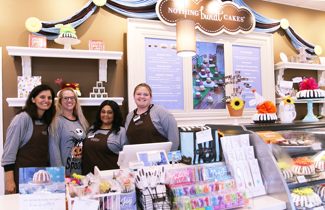 Bakery owner Yamini Desai and employees Jen Hopkins, Katrenia Riddle and Lexi Friend are all smiles at the recently opened Nothing Bundt Cakes bakery in Ormond Beach. Photo by Jarleene Almenas