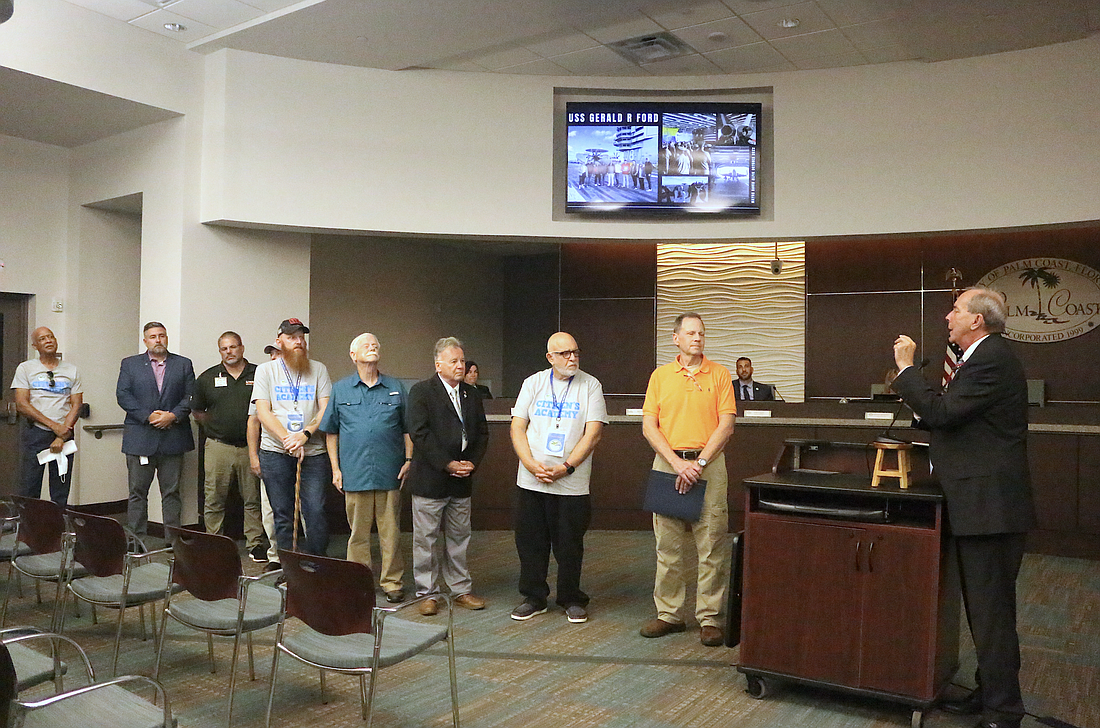 Palm Coast Mayor David Alfin asked all the veteran's at Tuesday's City Council meeting to stand at the front in recognition as he proclaimed November veteran's appreciation month. Photo by Sierra Williams