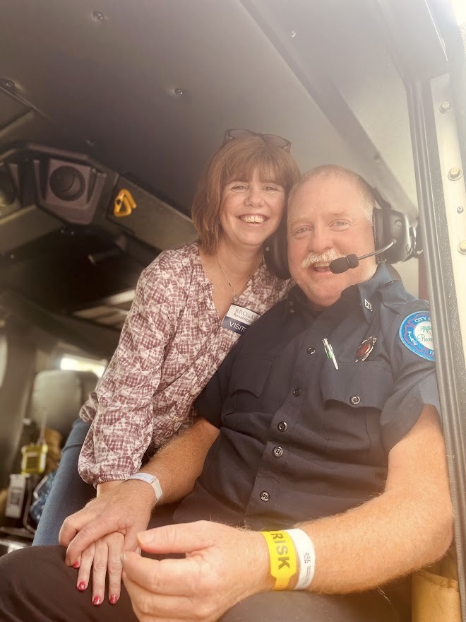 Brant and Josie Gammon coming home from rehab in a Palm Coast fire engine. Photo courtesy of the city of Palm Coast