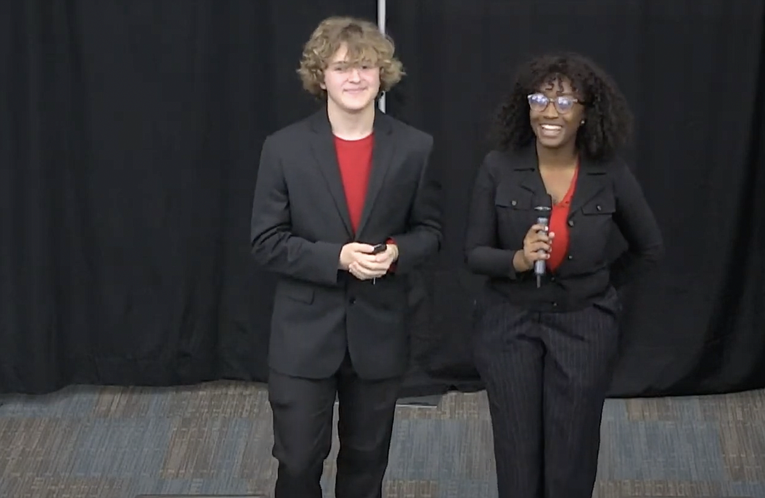 Cameron Driggers and Roymara Louissaint won first place in the 2022 UNF MedNexus Innovative Challenge. Image from City of Palm Coast livestream