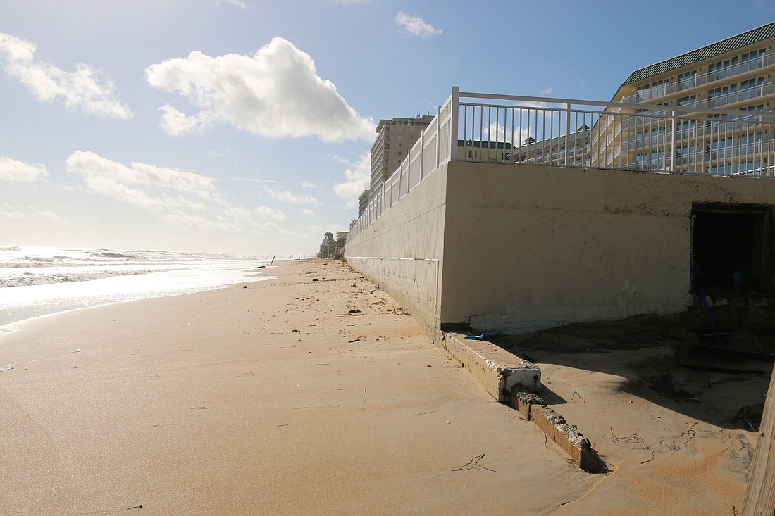 The beach near the Neptune Avenue beach approach was much narrower after Hurricane Nicole. File photo