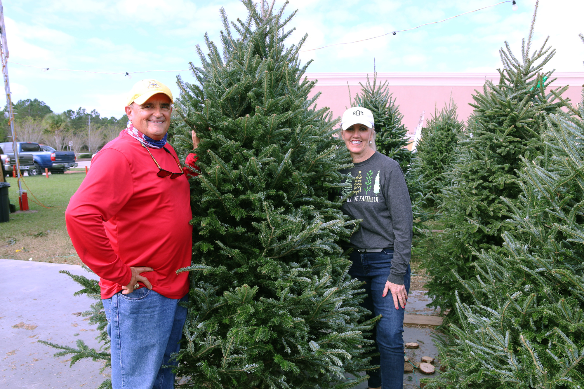 Michael and Robin Gentry are just as passionate about Christmas as their customers — they put up five trees each year at home. Photo by Jarleene Almenas