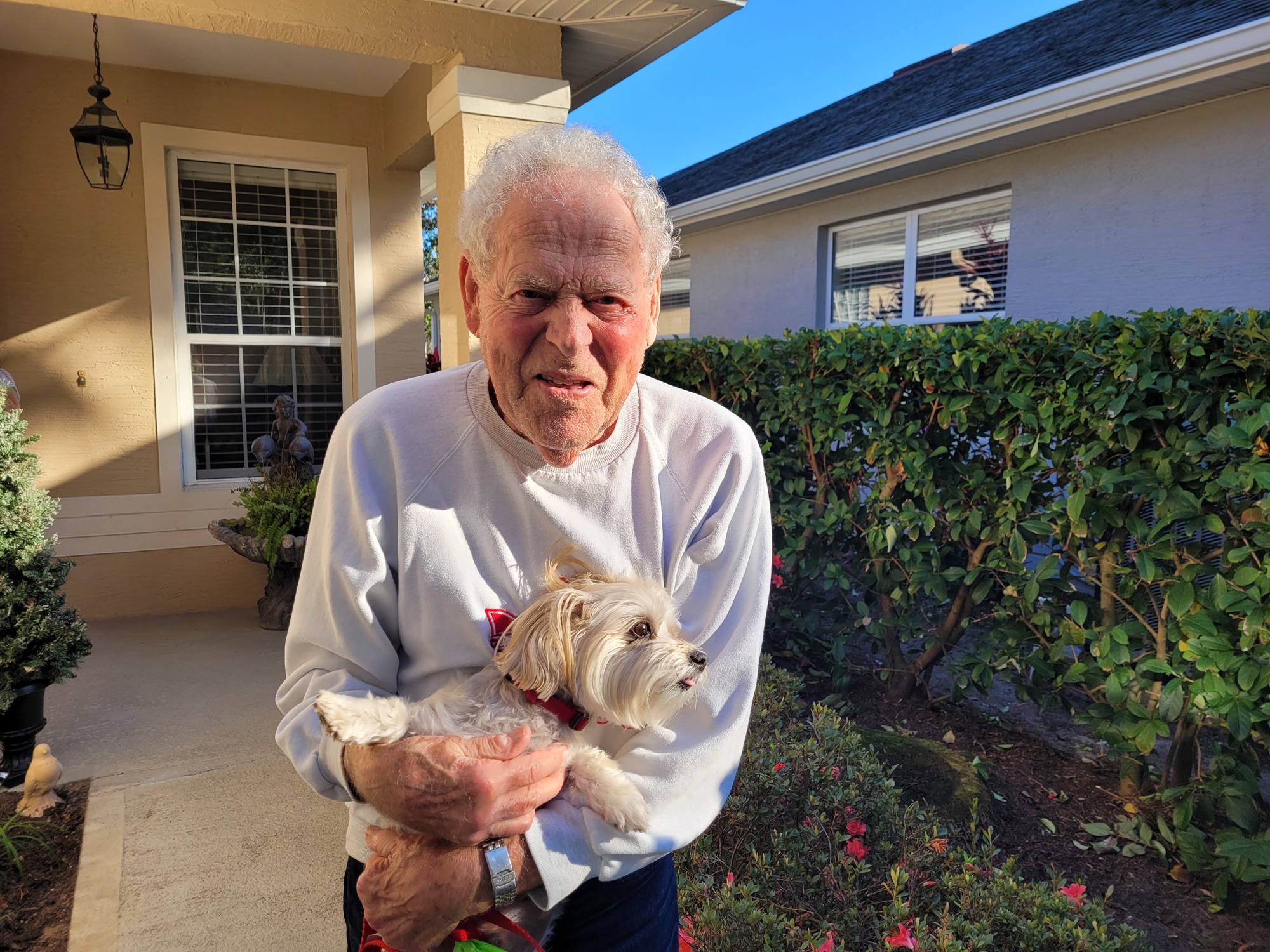 Dave Reisman, with his dog Riley, were barely out their front door when two wild hogs attack them. Photo by Sierra Williams