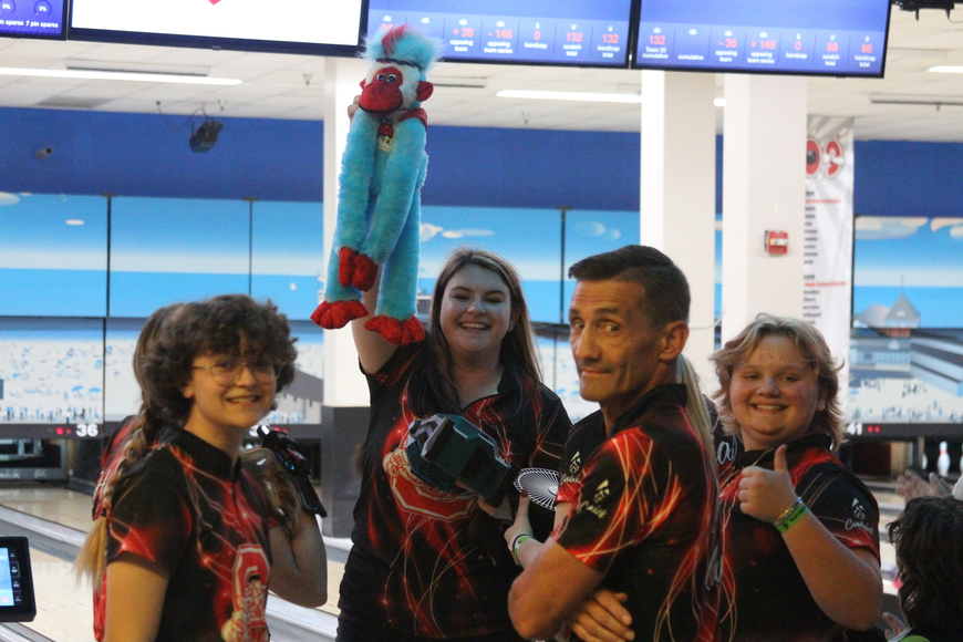 Seabreeze's Kara Beissel holds up the team's 