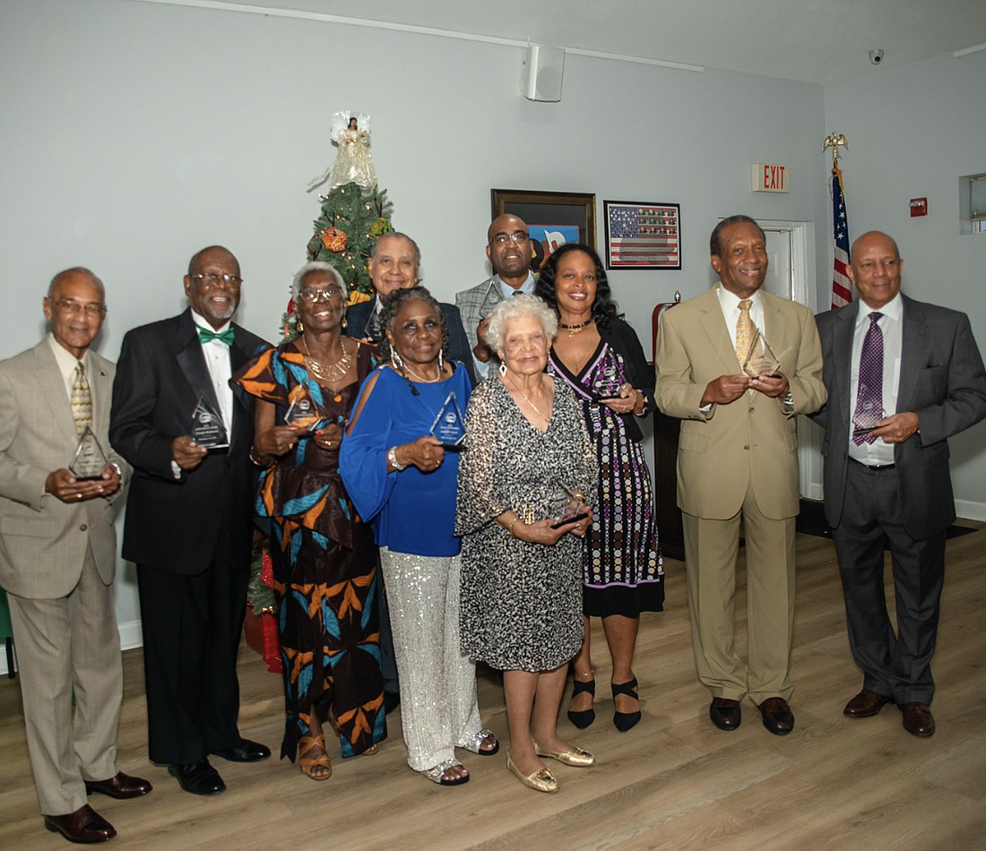 Back: Kurt Bottoms, Joseph Matthews, Imani Kinshasa William Seeney, Edmund Pinto III (accepting for his father), Melinda Morais, Robert Whiting, Victor Krause. In front: Janice Williams and Jean Tanner. Absent: Richard Barnes