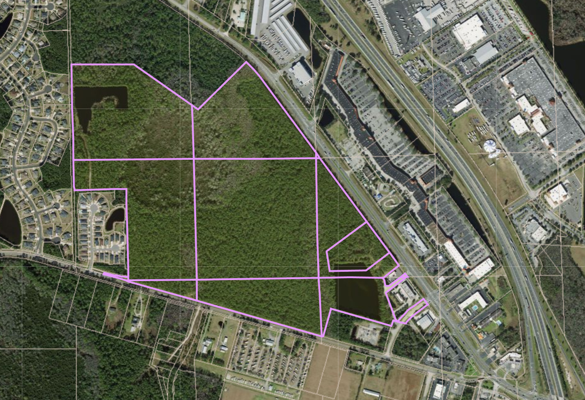 A satellite image shows the property owned by Elevation  Pointe LLC.