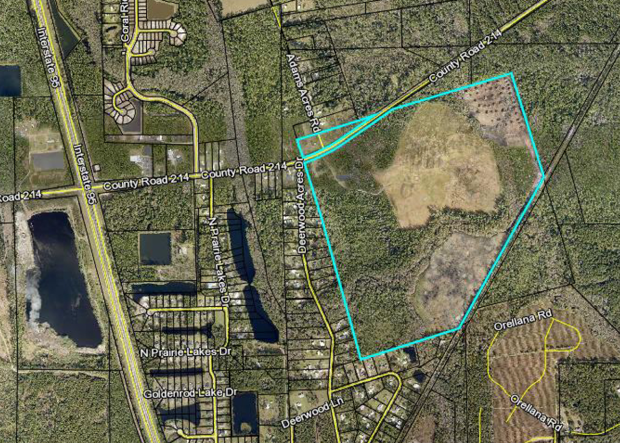 The project site is on the south side of County Road 214 between Interstate 95 and Holmes Boulevard.