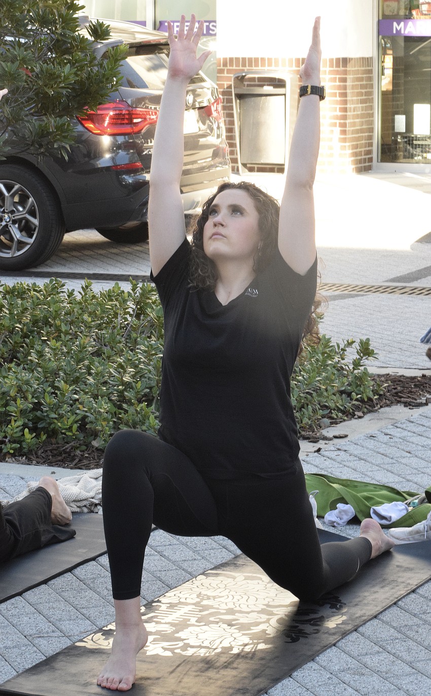 Lakewood Ranch's Gabrielle Bachtel, who is a Brain Health Scholar and a LECOM medical student, says it was a beautiful day to participate in Sirius Day Spa's New Year, New You event, which included a yoga class.