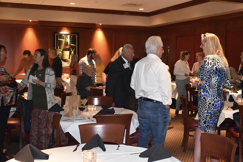 Members of the Longboat Key Chamber of Commerce mingle 