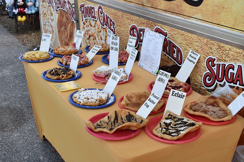 Those wanting something a little sweet at the fair had numerous choices, including these desserts at the Fried Dough Sugar Waffles stand.