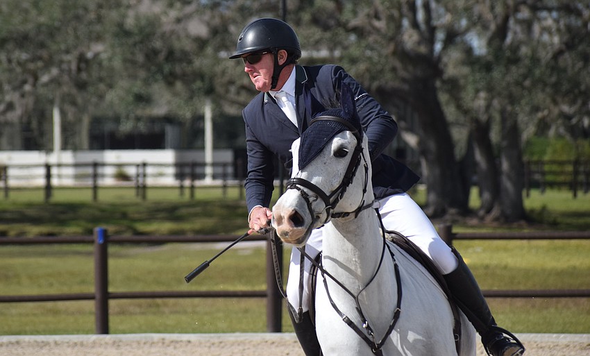 Australian Olympian Scott Keach and Wild Thing begin a flawless run which landed them in the jump-offs.