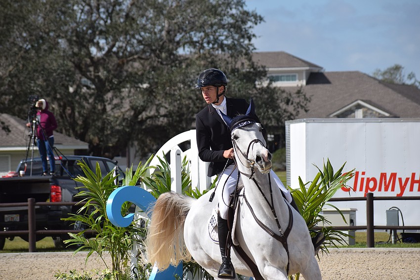 Brooks Hull, who is 15, turns Zechariah toward a jump. They failed to make the final four.
