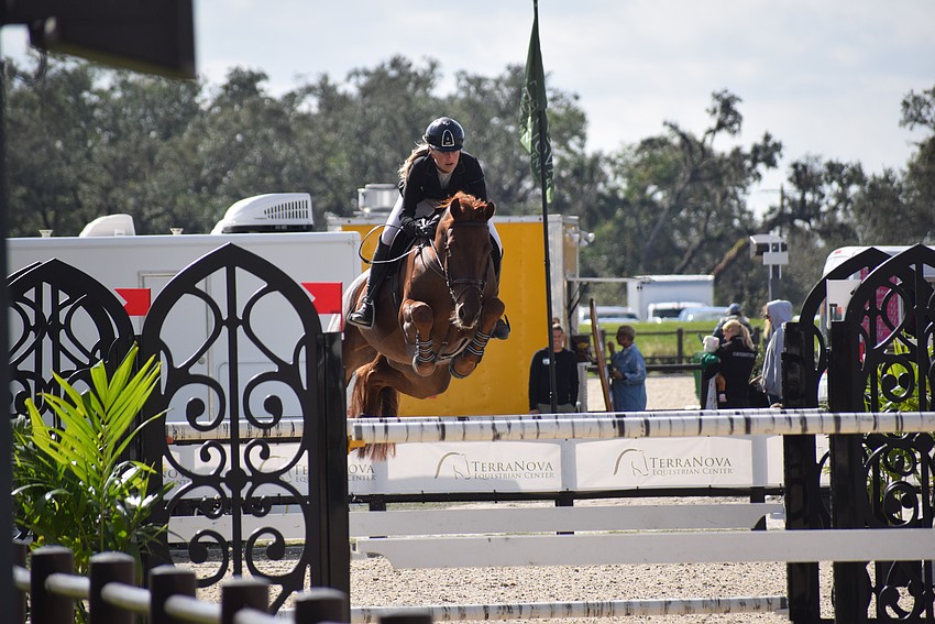 Kristen VanderVeen and Jasmijn breezed over a jump during the $50,000 Grand Prix of Sarasota, but they couldn't complete a clean run.