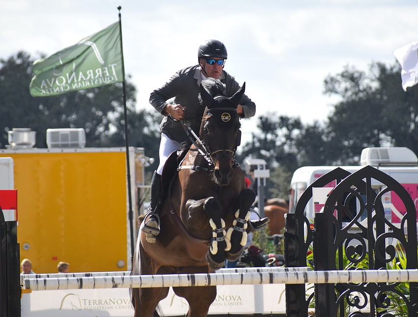 Allen Nabors leads Master Clinton DVE over a jump. They didn't make the final four.