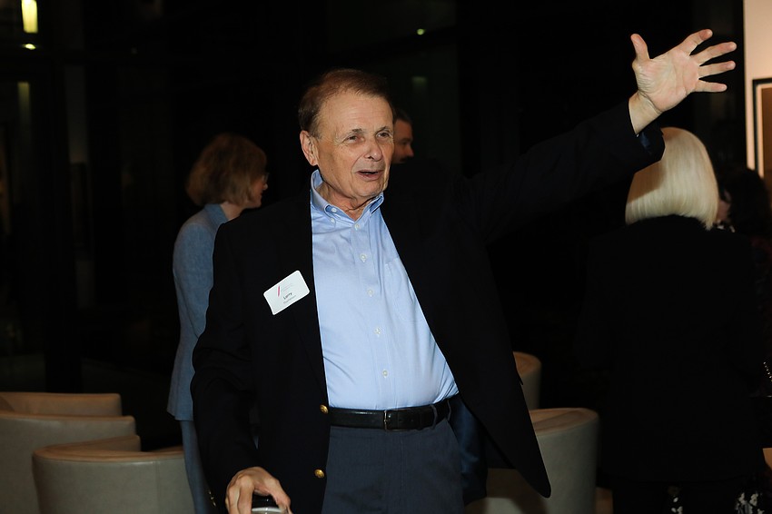 Larry Thompson corrals the crowd.