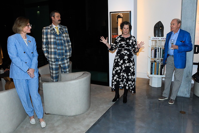 Executive Director Virginia Shearer welcomes the audience and becomes the art tour segment of the night.